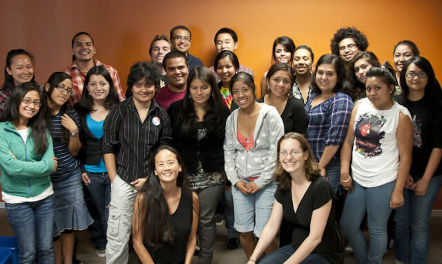 Photo of Katharine Gin and Carrie Evans with a group of students a the early years of E4FC, now Immigrants Rising.